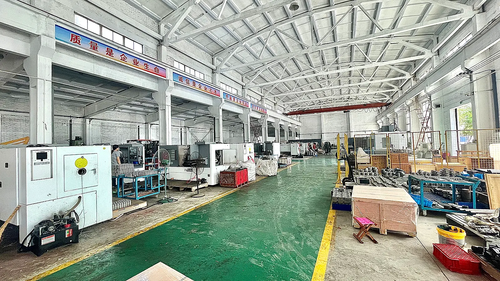 Wide view of a precision machining workshop producing oilfield equipment components
