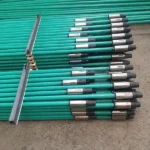 Fully encapsulated sucker rods with metal threaded connectors
